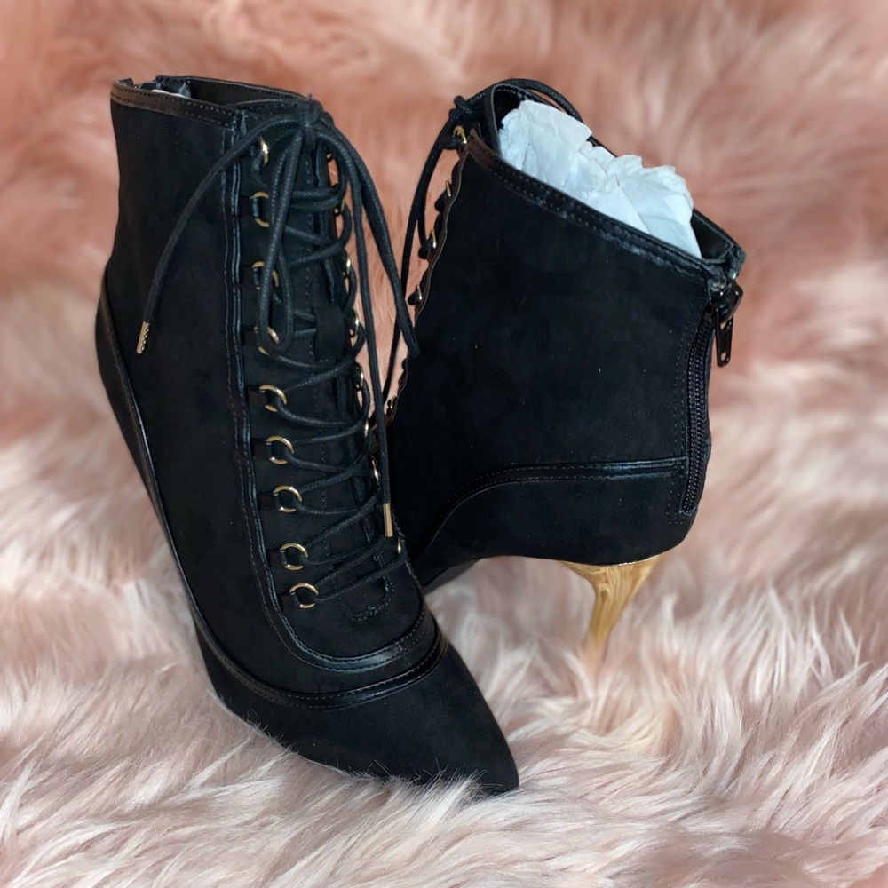 Black booties with gold heel